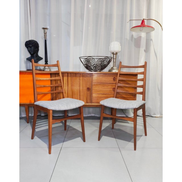 6 chairs made of teak wood with brand new upholstery. Perfect condition.