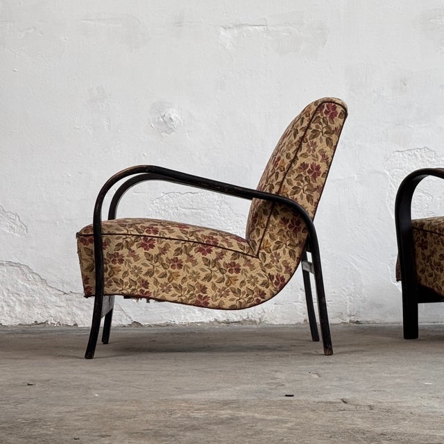 This iconic pair of armchairs was designed by the renowned duo karel koželka and antonín kropáček for interiér praha...