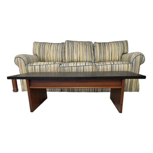 Mid Century Brutalist coffee table. The table features a faux slate (formica) insert top with grooved panel sides wood...