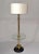 Vintage brass round glass side table floor lamp with drum shade made by Laurel Lamp Company. Features a unique...