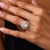 This impressive contemporary diamond ring is a bold design from the 2020’s, centered by a GIA-certified cushion brilliant...