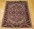 A truly exceptional and rare example of Persian weaving, this hand-knotted Heriz Serapi rug from the first quarter of the...