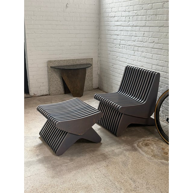 22.5x23x29 x16 sh seat height 22x22x15 A striking postmodern lounge chair with matching ottoman featuring dramatic...