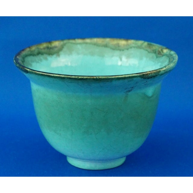 Ceramic bowl, entirely hand-shaped on a wheel and glazed in turquoise, signed by the artist "M. Faenza." Made by Pietro...