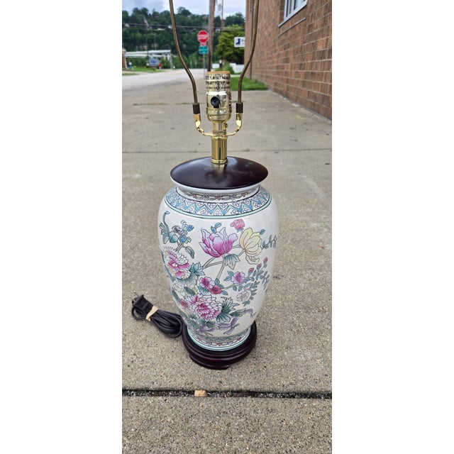 Bring timeless elegance to your home with this beautiful vintage Chinese porcelain table lamp featuring a colorful hand-...