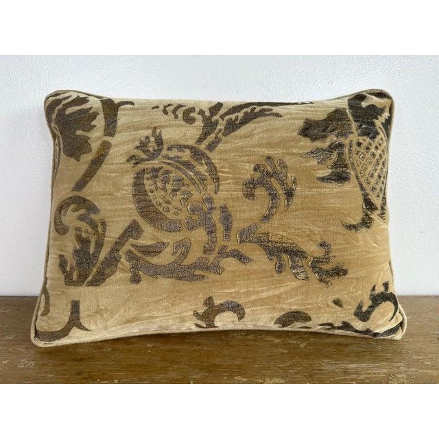 Sophisticated decorative pillow crafted from a velvet Nomi stenciled textile, featuring a classic scrolling motif rendered...