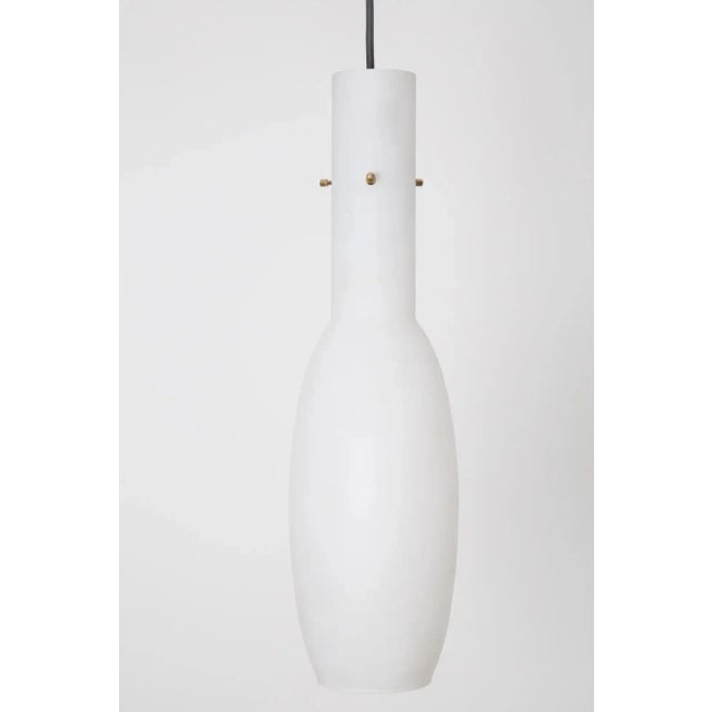 Large 1950s glass and brass suspension light attributed to Stilnovo. A quintessentially 1950s Italian design executed in...