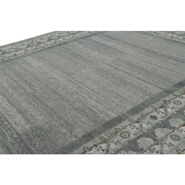 Hand-knotted in a luxurious blend of wool and silk, this 10x16 rug is an exciting addition to Modern Classics Collection |...