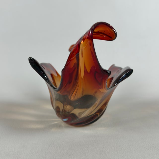 A magnificent and rare sculptural centerpiece with organic lines, a true collector's piece embodying the superb...