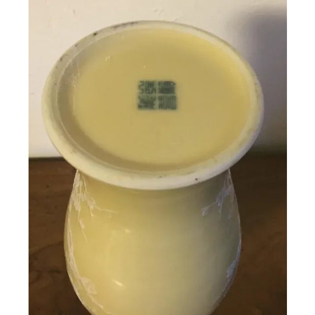 Chinese Art Deco porcelain monochrome yellow baluster shape vase with hand painted white prunus branches and exotic birds....