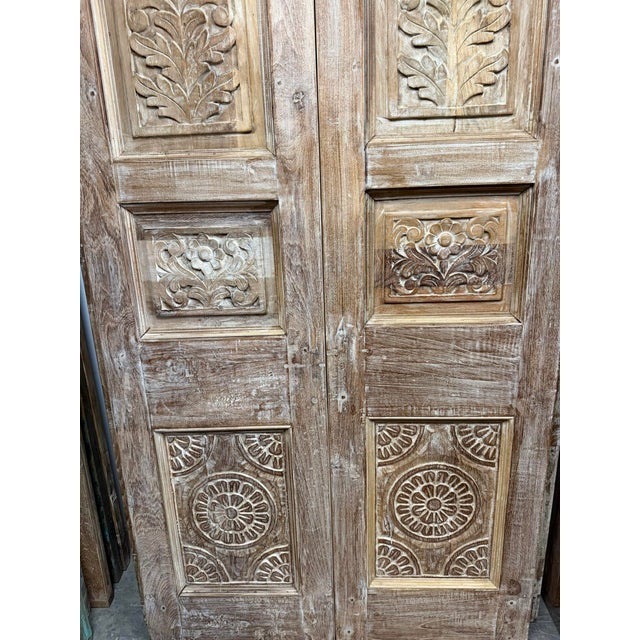 Bring timeless character and artisan craftsmanship into your home with this stunning pair of antique floral carved pantry...