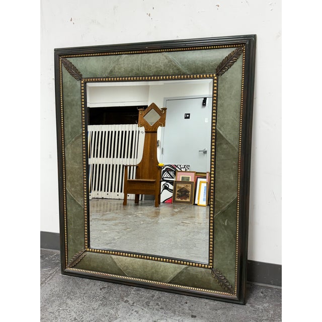 Design Plus Gallery presents an Art Deco Wall Mirror with French Accents. The rectangular shape is bordered with a thick...