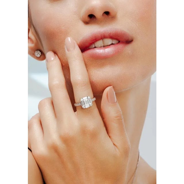 Diamond Cluster Engagement Ring in 18K Gold featuring natural diamond of 1.025 carats. The gorgeous handcrafted ring goes...
