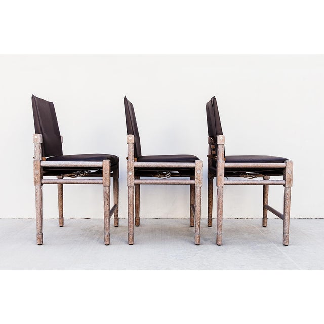 A set of three barely-used Chatwin counter chairs by Richard Wrightman, all with original tags. The frames are constructed...