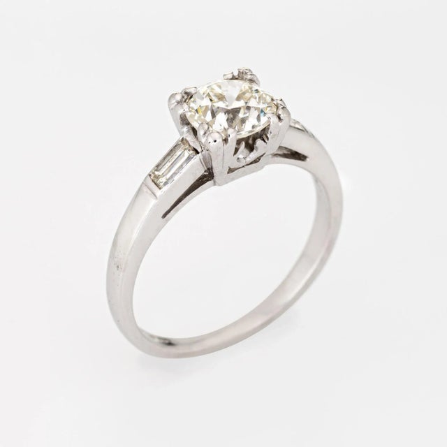This is part of Chairish’s Fine Jewelry assortment. Elegant & finely detailed Art Deco era engagement ring (circa 1920s to...
