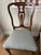 Beautiful pair of antique marquetry chairs from the late 19th century. The chairs have elaborate floral decorations...