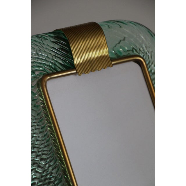 This magnificent vertical photo frame is purely in the tradition of Venetian glassmaking. The technique used to achieve...