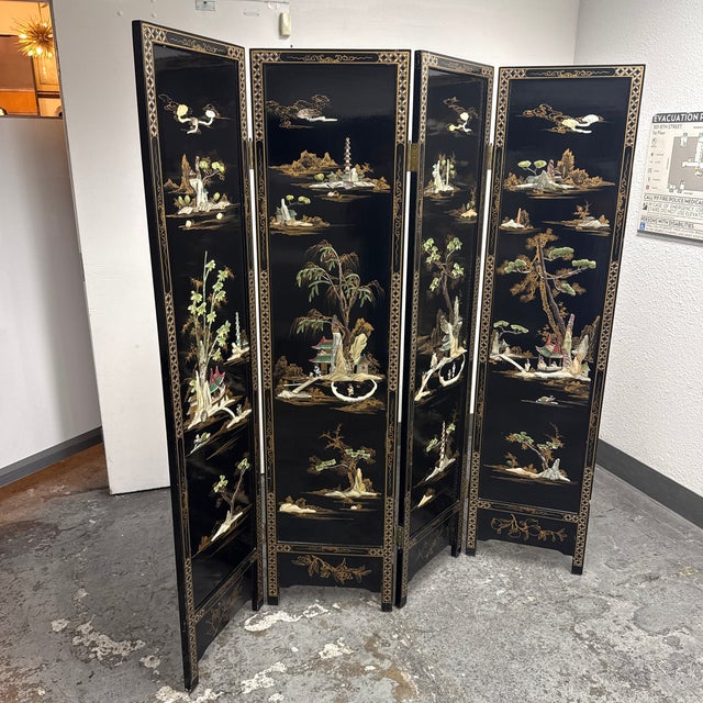 Design Plus Gallery presents a Vintage Asian Chinoiserie Black Lacquer Four-Panel Folding Screen. This decorative screen...