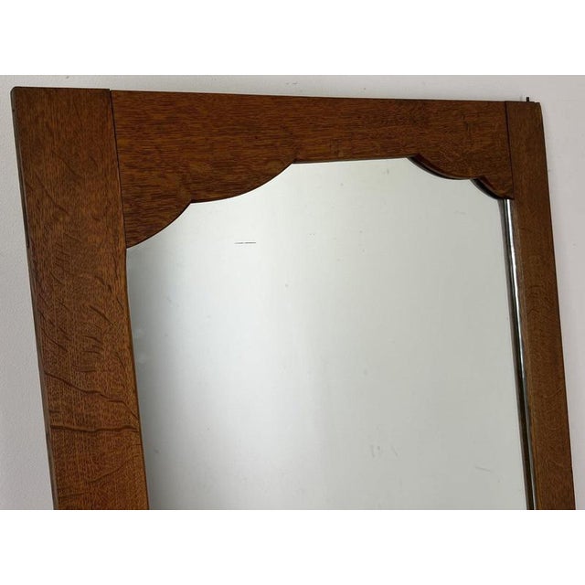 This elegant Antique French mirror , originally part of a wardrobe, features a beautifully proportioned oak frame with a...