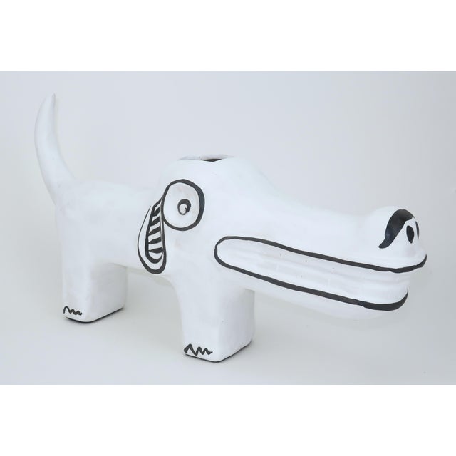 Inspired by Picasso's innovative ceramic designs, Xiang Yang created 'Spot the Dog' for Currey & Company...a chalky white...