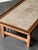 Monumental travertine and walnut coffee table with iron detailing. Very well made and solid. Minimal wear from age. 65.5”L...