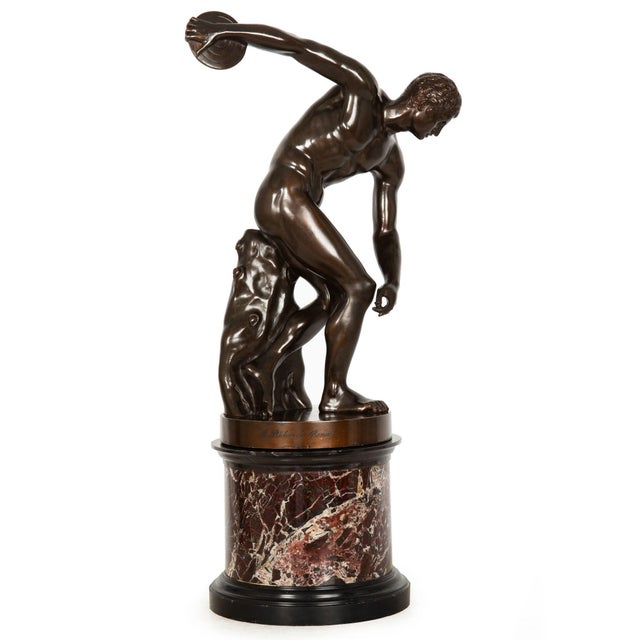 GRAND TOUR Italy, late 19th century "The Discobolus" after Myron of Antiquity Patinated bronze Italy, circa 1840 Cast by...