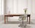 A grand French mid-century modern bureau plat writing desk, or library table constructed from fruitwood with an inset...