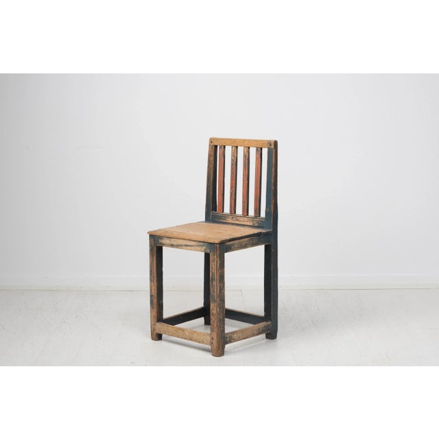 Charming Swedish folk art chair from Hälsingland in Sweden. The chair is made during the early 1800s in Swedish pine. It...