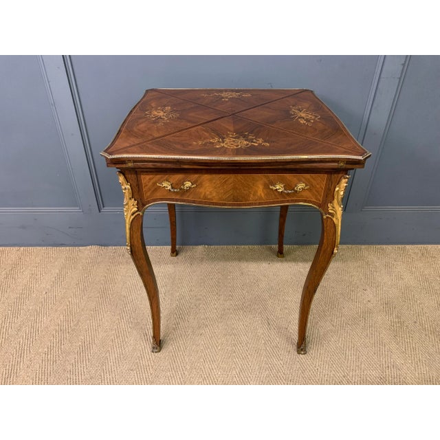A fine quality late 19th century inlaid rosewood games , or card, table by Maple & Co. of London. Very well constructed in...