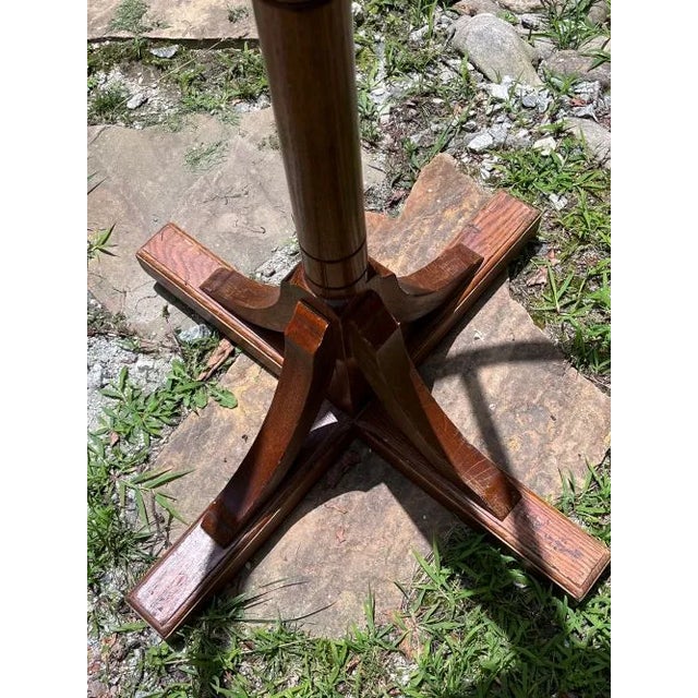 Antique oak clothing carousel that revolves for personal use or commercial display. Round rack comes off easily and spins...