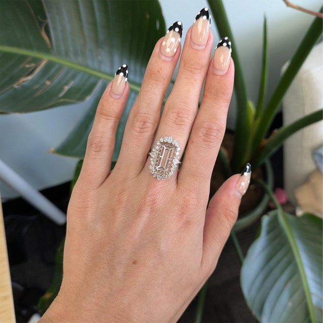 A striking semi-mount ring in solid two-tone 14K white and yellow gold, set with twenty-four lab grown diamond accents and...