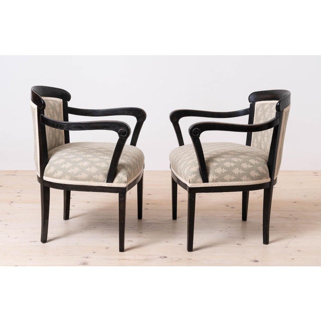 Set of two Armchairs made around mid 19th Century, most probably in Austria, meticulously crafted with a solid oak wooden...