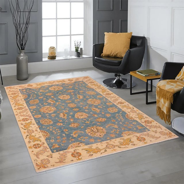 "Enhance the ambiance of your home with this magnificent Persian-influenced Turkish hand-knotted rug made by skilled...