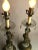 Very beautiful pair of crystal and bronze and marble cherub lamps. They both work. one seems to have been sliced together...