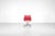 Swivel office chair, model "ea108", in vibrant red leather with a chrome frame. designed by charles and ray eames for...