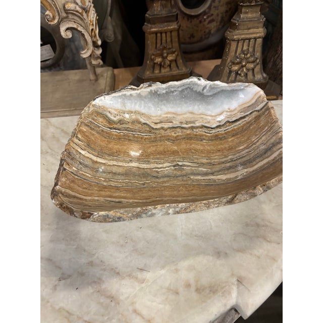 A lovely wide-cut square onyx bowl with natural edges. This bowl would make a beautiful addition to a coffee table with...
