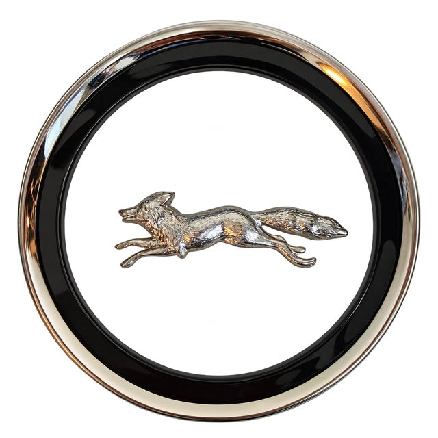 A charming set of four vintage decorative coasters featuring dimensional running fox motifs suspended within clear centers...