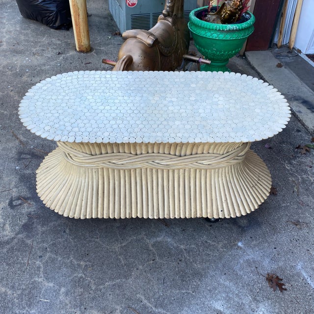 In perfect condition White Reed Coffee Table With Glass. Great for the interior designer.