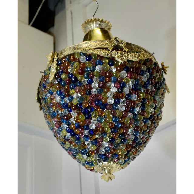 Large French Multi Coloured Teardrop Lamp Shade The Brass frame is very attractively set with coloured crystal beads and...