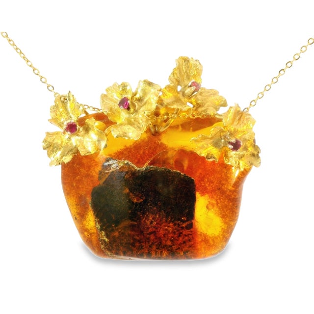 14K yellow gold amber ruby floral pendant necklace. This rare and beautiful piece features one oversized natural amber ,...