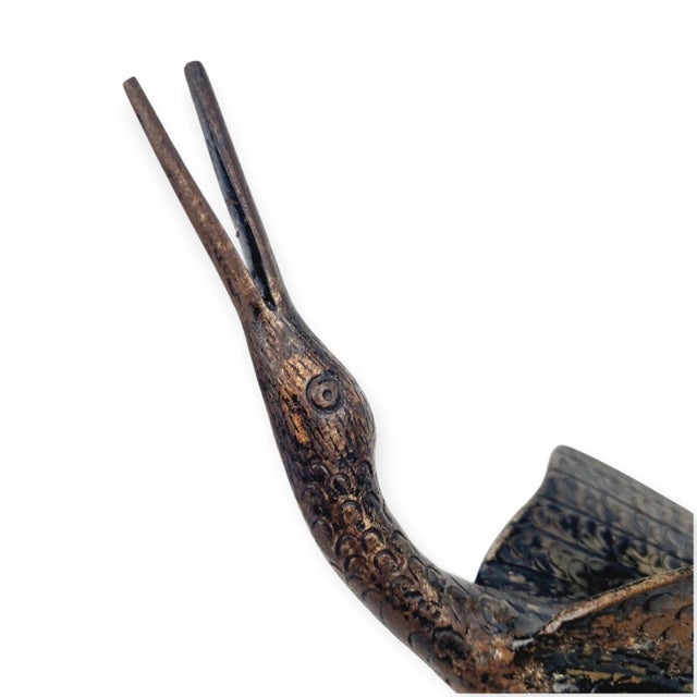 Crane bird from the 1970s. Material: bronzed metal. with its characteristic long neck and legs, it is an elegant, graceful...