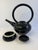 Fabulous handcrafted pottery teapot with top and small pedestal for display. With a sweeping round handle the modern...