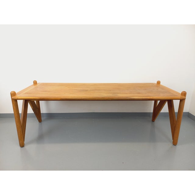 Large rectangular vintage dining table from the 1960s/70s, made of solid oak. Manufactured by Fratelli Montina, superb...