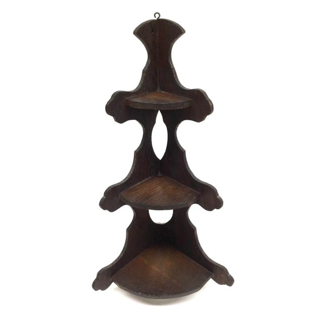 Hand crafted antique corner shelf unit made in the early 1900s. Intriguing way of construction but lends itself to the...