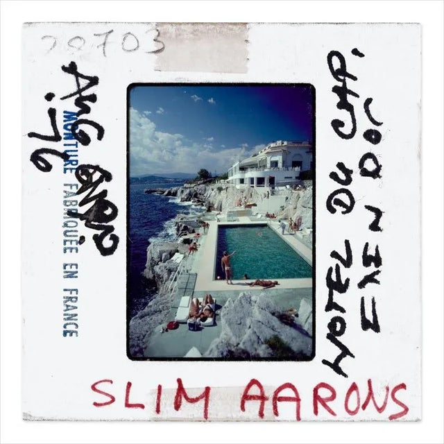 Eden Roc Pool Slide 1976 Slide of a photograph showing Guests round the swimming pool at the Hotel du Cap Eden-Roc,...