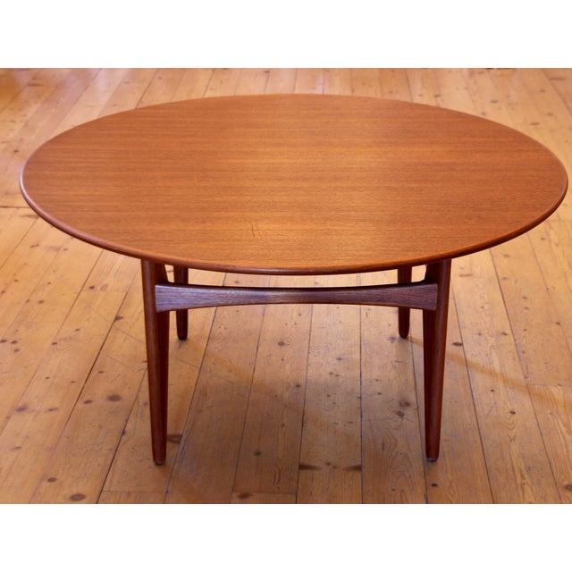 Teak side or coffee table. Designed by Karl-Erik Ekselius for JOC - J.O. Carlsson, Sweden. The tabletop is screwed onto...