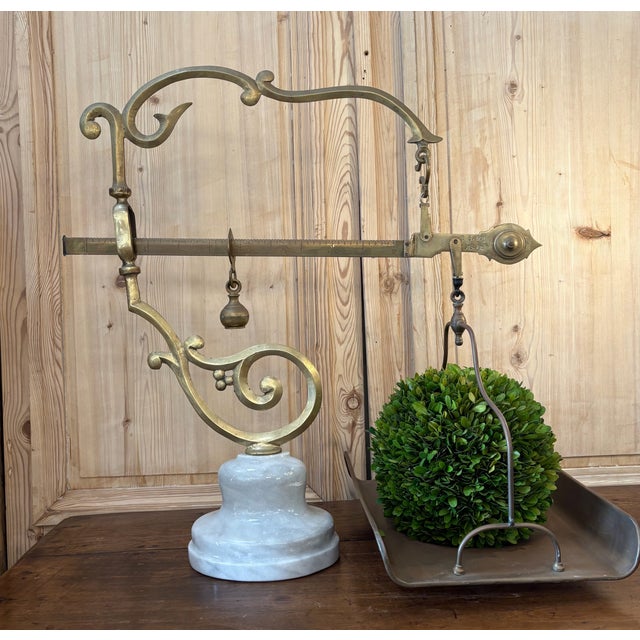 P Quindici 19th century Chilog Brass and marble Scale and Balance. The scale features marble base, ornate brass frame,...