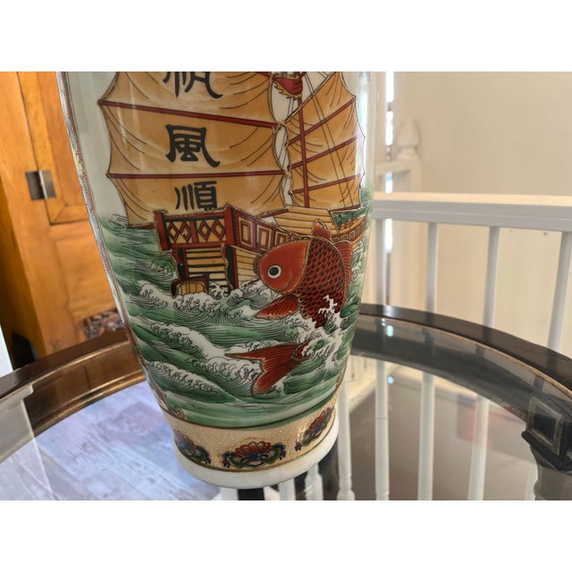 mid-century Chinese porcelain baluster floor vase. It features an exceptionally vivid, hand-painted polychrome palette....