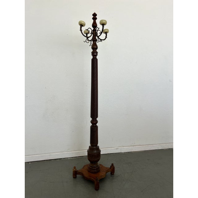 Rich in detail and presence, this antique German hall tree blends Baroque Revival ornamentation with Victorian-era...