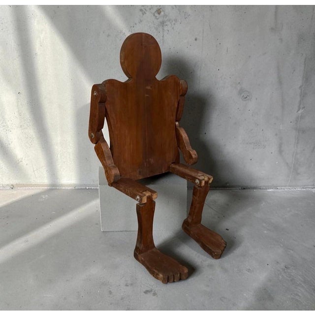 An exceptional piece of mid-century American folk art, this large-scale, 54-inch articulated wooden mannequin seamlessly...
